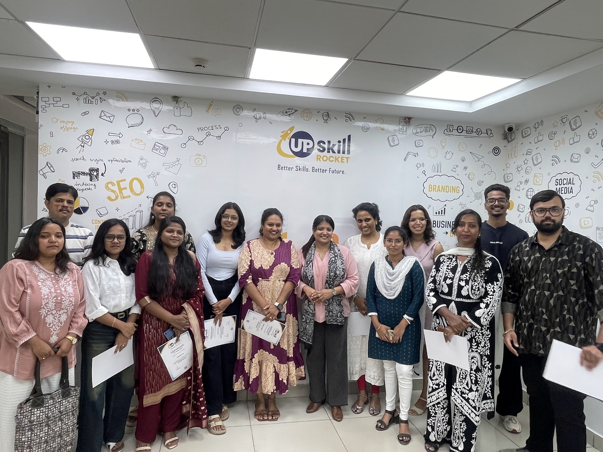 Group of Upskill Rocket learners with their certificates
