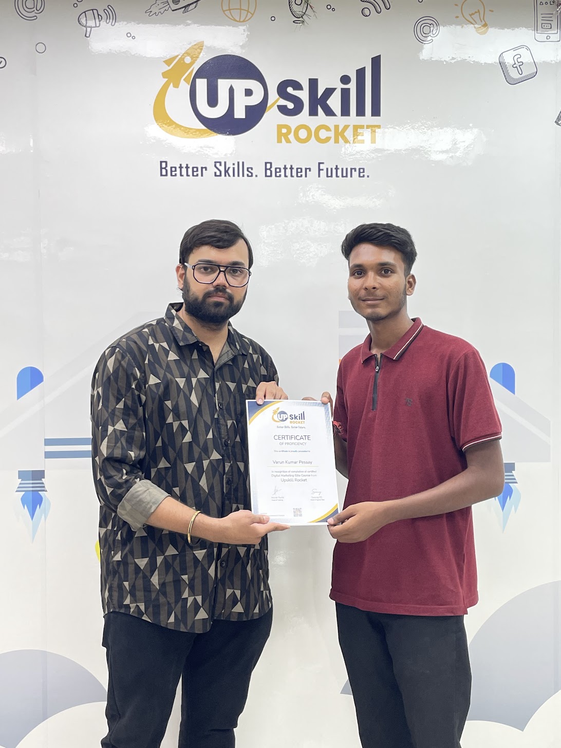 Student being handed his Upskill Rocket course certificate