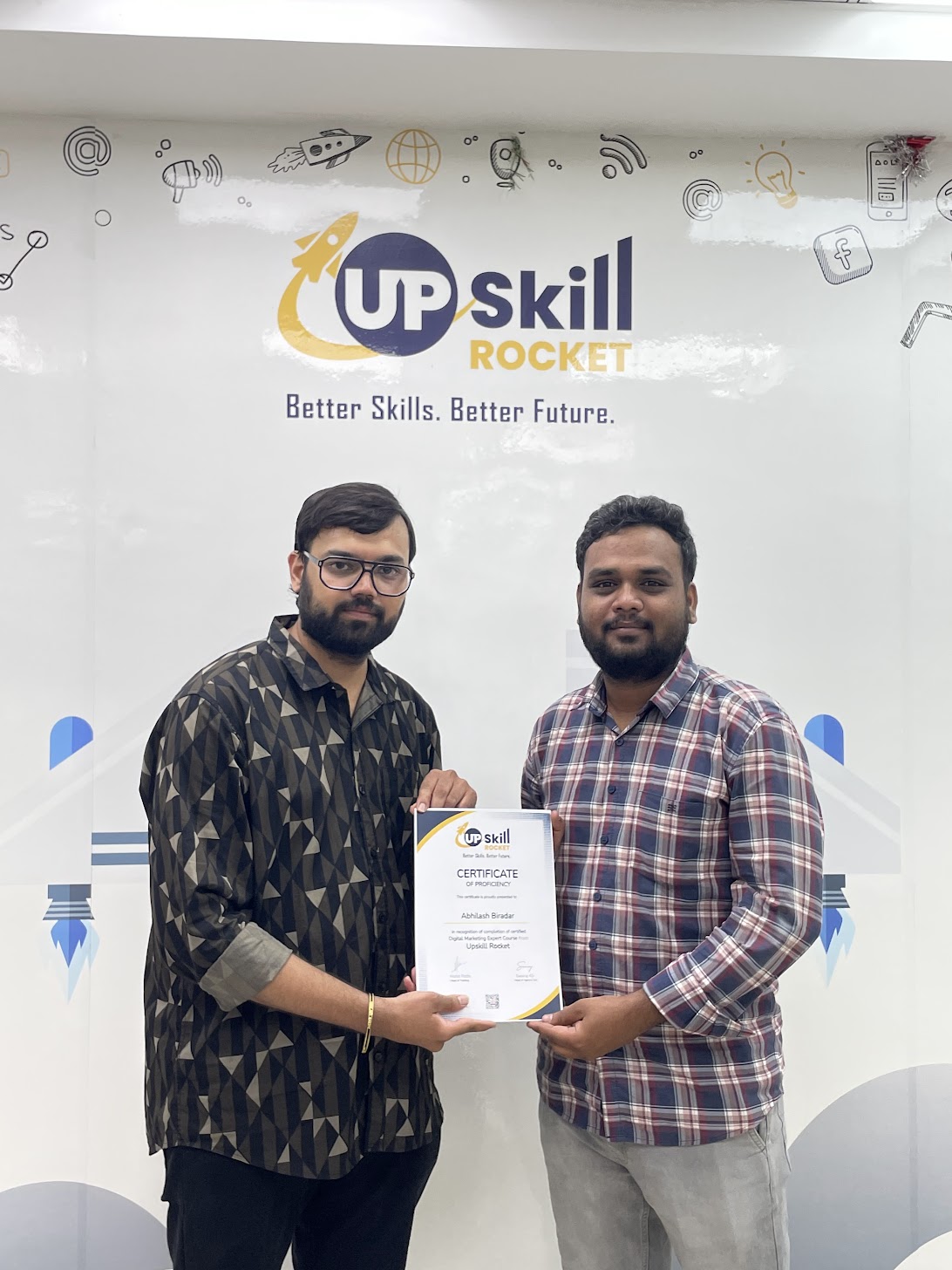 Upskill Rocket learner receiving his certificate of proficiency