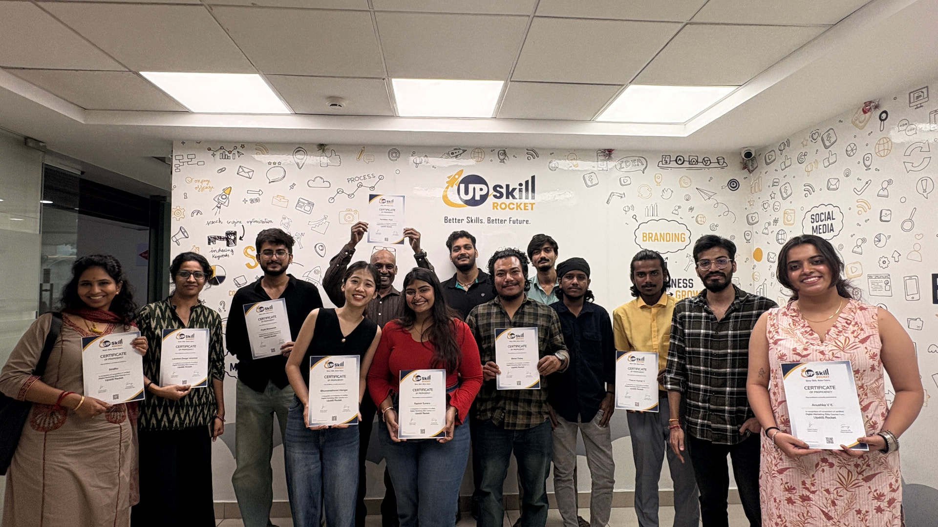 Upskill Rocket students and mentors celebrating together with course certificates